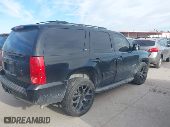 2012 GMC Yukon SLT with VIN 1GKS2CE06CR150096, listed as a IAAI auction lot 41703820 with 308,958 mi miles. Bid and sale history available at carsss.com. Image 4.