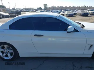 2014 BMW 4 Series 428i with VIN WBA3V7C54EP770552, listed as a IAAI auction lot 41297640 with 114,763 mi miles and . Bid and sale history available at DreamBid. Image 14.