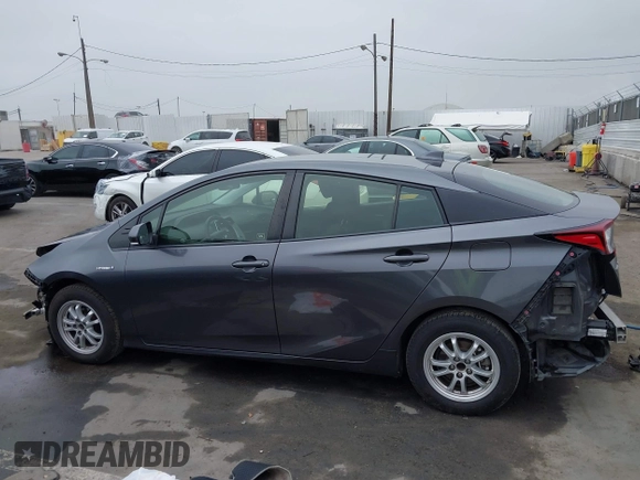 2021 Toyota Prius L Eco with VIN JTDKAMFU8M3144391, listed as a IAAI auction lot 42477718 with 314,346 mi miles and . Bid and sale history available at DreamBid. Image 15.