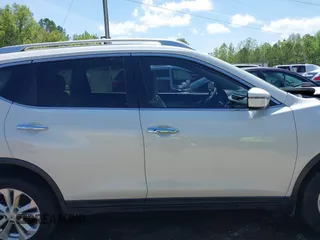 2016 Nissan Rogue SV with VIN KNMAT2MT2GP633600, listed as a IAAI auction lot 39191100 with 128,051 mi miles and . Bid and sale history available at DreamBid. Image 13.