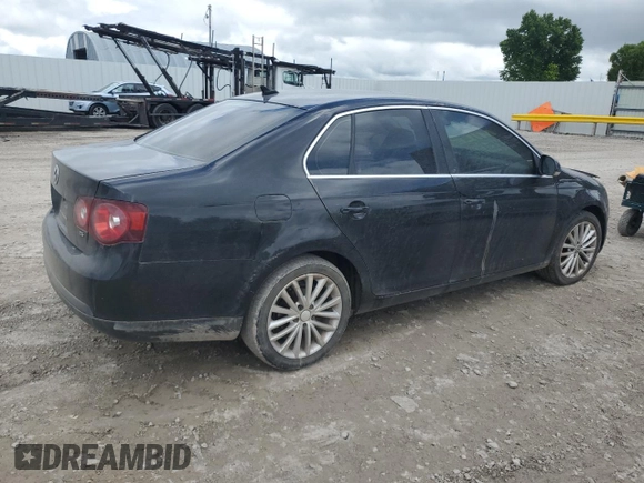 2009 Volkswagen Jetta SE with VIN 3VWRM71K49M172348, listed as a Copart auction lot 60603895 with 129,515 mi miles and Salvage title. Bid and sale history available at DreamBid. Image 3.