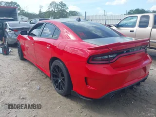 2020 Dodge Charger R/T z VIN 2C3CDXCT2LH106714, wystawiony jako IAAI lot #41860126 z przebiegiem 128 195 mil mil oraz . Historia ofert i sprzedaży dostępna na DreamBid. Obrazek 3.