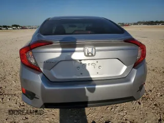 2017 Honda Civic LX z VIN 19XFC2F50HE032708, wystawiony jako Copart lot #52510535 z przebiegiem 83 467 mil mil oraz Szkoda całkowita • Salvage title. Historia ofert i sprzedaży dostępna na DreamBid. Obrazek 6.