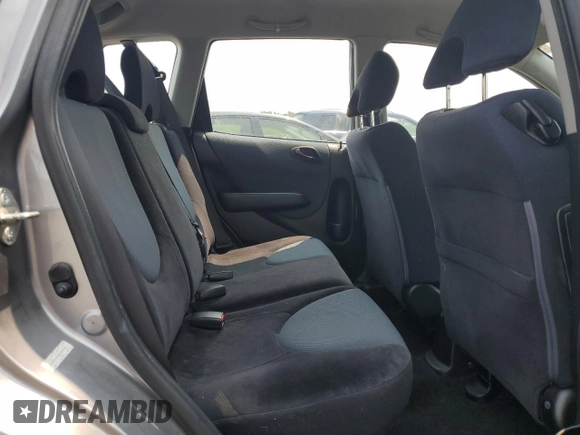 2008 Honda Fit z VIN JHMGD38468S039427, wystawiony jako Copart lot #59571995 z przebiegiem 125 476 mil mil oraz Szkoda całkowita • Salvage title. Historia ofert i sprzedaży dostępna na DreamBid. Obrazek 10.