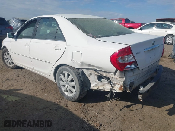 2003 Toyota Camry LE with VIN 4T1BE32K33U249945, listed as a IAAI auction lot 41907000 with 279,723 mi miles and . Bid and sale history available at DreamBid. Image 3.