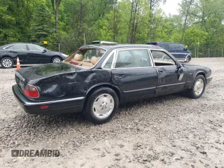 1997 Jaguar XJ with VIN SAJHX6248VC806189, listed as a Copart auction lot 57891035 with 51,654 mi miles and Salvage title. Bid and sale history available at DreamBid. Image 3.