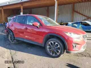 2016 Mazda CX-5 Grand Touring z VIN JM3KE4DY9G0753691, wystawiony jako Copart lot #57361645 z przebiegiem 90 733 mil mil oraz Szkoda całkowita • Salvage title. Historia ofert i sprzedaży dostępna na DreamBid. Obrazek 4.