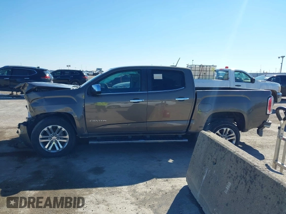 2015 GMC Canyon 2WD SLT with VIN 1GTG5CE32F1215628, listed as a IAAI auction lot 41412762 with 182,615 mi miles. Bid and sale history available at carsss.com. Image 14.