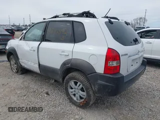 2006 Hyundai Tucson GLS with VIN KM8JN72D26U322893, listed as a IAAI auction lot 41882842 with 116,972 mi miles. Bid and sale history available at carsss.com. Image 3.