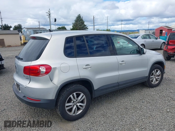 2013 Volkswagen Tiguan SEL with VIN WVGBV3AX1DW571843, listed as a IAAI auction lot 42540191 with 140,639 mi miles and . Bid and sale history available at DreamBid. Image 4.