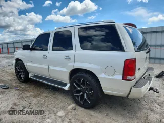 2004 Cadillac Escalade with VIN 1GYEK63N74R228938, listed as a Copart auction lot 63845725 with 267,438 mi miles and Salvage title. Bid and sale history available at DreamBid. Image 2.