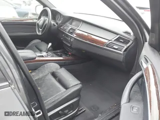 2011 BMW X5 35i with VIN 5UXZV4C58BL410570, listed as a IAAI auction lot 41886238 with 164,192 mi miles. Bid and sale history available at carsss.com. Image 5.