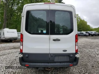 2016 Ford Transit Cargo z VIN 1FTYR2CM1GKB43234, wystawiony jako Copart lot #88966655 z przebiegiem 59 239 mil mil oraz Szkody całkowita. Historia ofert i sprzedaży dostępna na DreamBid. Obrazek 6.