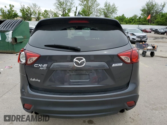 2014 Mazda CX-5 Touring z VIN JM3KE4CY2E0368729, wystawiony jako Copart lot #55563645 z przebiegiem 204 521 mil mil oraz Szkoda całkowita • Salvage title. Historia ofert i sprzedaży dostępna na DreamBid. Obrazek 6.