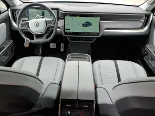 2023 Rivian R1T Launch Edition with VIN 7FCTGAAL7PN019188, listed as a Copart auction lot 55100405 with 13,654 mi miles and Salvage Title. Bid and sale history available at DreamBid. Image 8.