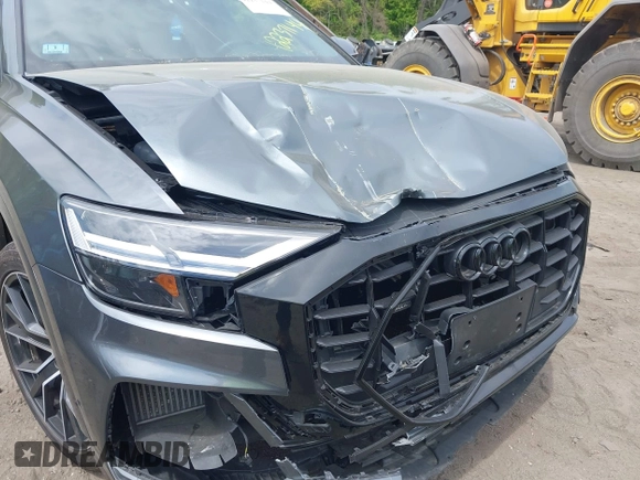 2021 Audi Q8 Premium Plus with VIN WA1EVAF14MD036327, listed as a IAAI auction lot 42237144 with 59,157 mi miles and . Bid and sale history available at DreamBid. Image 6.