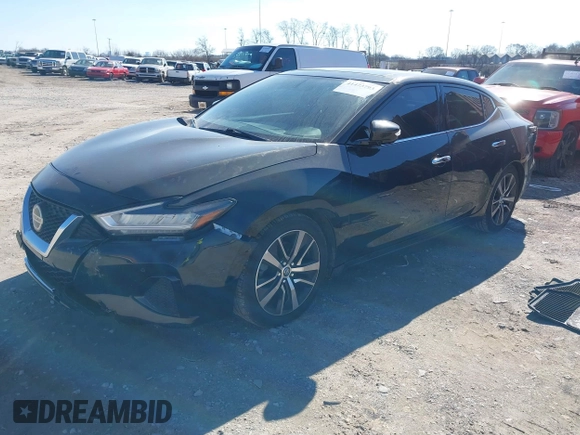 2019 Nissan Maxima Platinum z VIN 1N4AA6AV0KC365901, wystawiony jako IAAI lot #41473793 z przebiegiem 137 772 mil mil oraz . Historia ofert i sprzedaży dostępna na DreamBid. Obrazek 2.