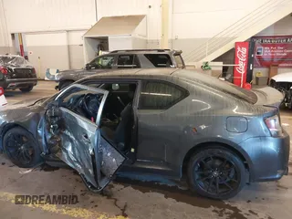 2014 Scion tC with VIN JTKJF5C77E3069906, listed as a IAAI auction lot 41243445 with 128,791 mi miles. Bid and sale history available at carsss.com. Image 14.