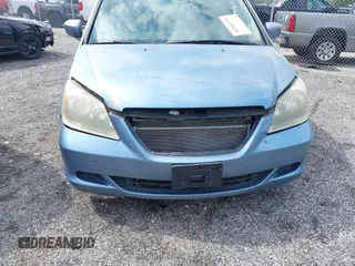 2007 Honda Odyssey EX z VIN 5FNRL38467B087065, wystawiony jako IAAI lot #42204370 z przebiegiem 242 844 mil mil oraz . Historia ofert i sprzedaży dostępna na DreamBid. Obrazek 6.