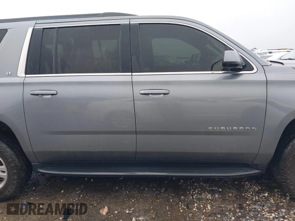 2019 Chevrolet Suburban LT with VIN 1GNSKHKCXKR405555, listed as a IAAI auction lot 42188860 with 143,435 mi miles and . Bid and sale history available at DreamBid. Image 13.