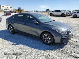 2019 Kia Forte LXS with VIN 3KPF24AD2KE116338, listed as a Copart auction lot 50497795 with 121,324 mi miles and Salvage Title. Bid and sale history available at DreamBid. Image 4.
