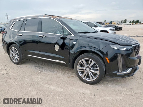 2024 Cadillac XT6 FWD Premium Luxury with VIN 1GYKPCRS7RZ709179, listed as a Copart auction lot 62374585 with 19,442 mi miles and Salvage title. Bid and sale history available at DreamBid. Image 4.