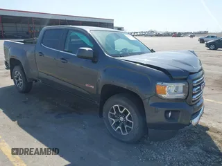 2016 GMC Canyon 4WD SLE z VIN 1GTG6CE32G1189451, wystawiony jako IAAI lot #42057262 z przebiegiem 143 721 mil mil oraz . Historia ofert i sprzedaży dostępna na DreamBid. Obrazek 1.