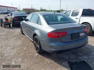 2016 Audi A4 Premium with VIN WAUAFAFL4GA004435, listed as a IAAI auction lot 41891165 with 154,817 mi miles. Bid and sale history available at carsss.com. Image 3.