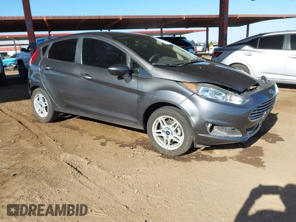 2019 Ford Fiesta SE with VIN 3FADP4EJ8KM101816, listed as a IAAI auction lot 41615459 with 71,028 mi miles. Bid and sale history available at carsss.com. Image 1.