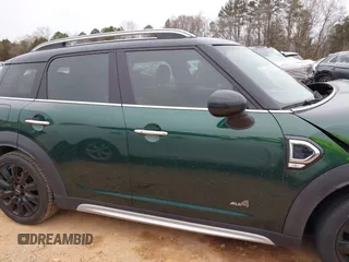 2019 MINI Countryman Cooper S z VIN WMZYT5C57K3G91854, wystawiony jako IAAI lot #41394154 z przebiegiem 68 629 mil mil oraz . Historia ofert i sprzedaży dostępna na DreamBid. Obrazek 13.