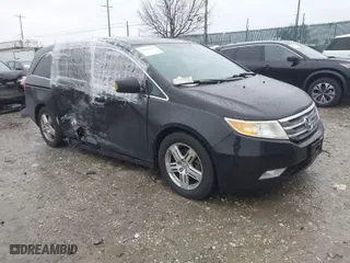 2013 Honda Odyssey Touring with VIN 5FNRL5H97DB059472, listed as a IAAI auction lot 41856559 with 1 mi miles. Bid and sale history available at carsss.com. Image 1.