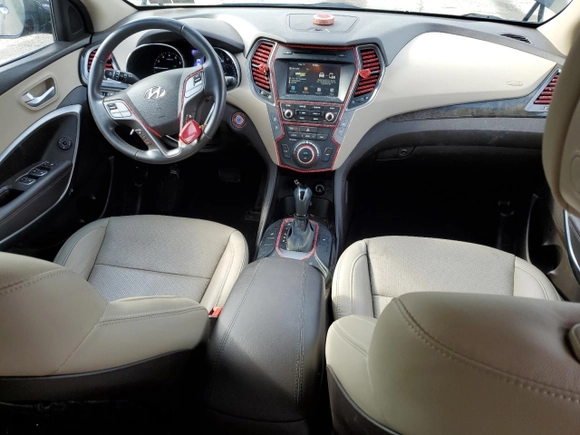 2017 Hyundai Santa Fe 2.4L z VIN 5XYZUDLB1HG412675, wystawiony jako Copart lot #57169045 z przebiegiem 38 947 mil mil oraz Szkoda całkowita • Salvage title. Historia ofert i sprzedaży dostępna na DreamBid. Obrazek 8.