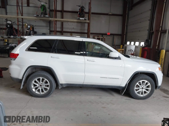 2014 Jeep Grand Cherokee Laredo with VIN 1C4RJFAG4EC309401, listed as a IAAI auction lot 41996233 with 243,541 mi miles and . Bid and sale history available at DreamBid. Image 13.