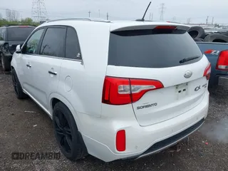 2014 Kia Sorento SX with VIN 5XYKW4A77EG449963, listed as a IAAI auction lot 41963370 with 182,072 mi miles. Bid and sale history available at carsss.com. Image 3.