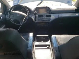 2006 Honda Odyssey Touring z VIN 5FNRL388X6B009356, wystawiony jako Copart lot #55991335 z przebiegiem 101 816 mil mil oraz Szkoda całkowita • Salvage title. Historia ofert i sprzedaży dostępna na DreamBid. Obrazek 8.