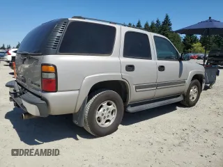 2004 Chevrolet Tahoe LS with VIN 1GNEC13V24J321605, listed as a Copart auction lot 64476065 with 176,551 mi miles and Salvage title. Bid and sale history available at DreamBid. Image 3.
