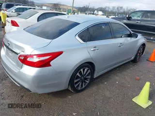 2016 Nissan Altima SV with VIN 1N4AL3AP0GC262897, listed as a IAAI auction lot 41063385 with 157,331 mi miles and . Bid and sale history available at DreamBid. Image 4.