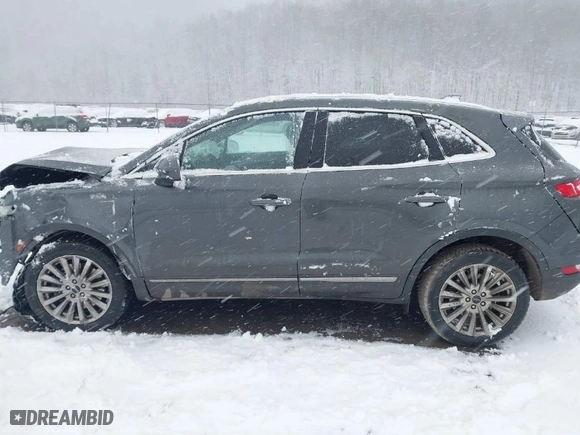 2019 Lincoln MKC Standard with VIN 5LMCJ1D99KUL17837, listed as a IAAI auction lot 41232384 with 80,952 mi miles. Bid and sale history available at carsss.com. Image 14.