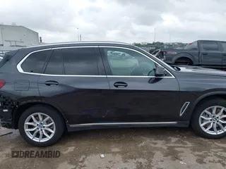2021 BMW X5 xDrive45e with VIN 5UXTA6C02M9F88978, listed as a IAAI auction lot 42201563 with 23,339 mi miles and . Bid and sale history available at DreamBid. Image 14.