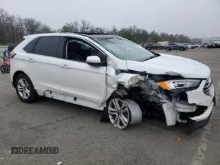 2020 Ford Edge SEL z VIN 2FMPK4J9XLBB30184, wystawiony jako Copart lot #56839925 z przebiegiem 38 563 mil mil oraz Szkoda całkowita • Salvage title. Historia ofert i sprzedaży dostępna na DreamBid. Obrazek 4.