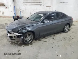 2015 BMW 3 Series 320i xDrive with VIN WBA3C3C52FK200479, listed as a Copart auction lot 52575125 with 153,930 mi miles and Salvage title. Bid and sale history available at DreamBid. Image 1.