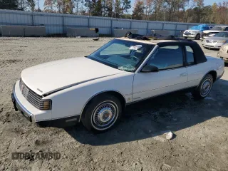 1987 Oldsmobile Toronado with VIN 1G3EZ1130HU307201, listed as a Copart auction lot 78028584 with 104,837 mi miles and Salvage Title. Bid and sale history available at DreamBid. Image 1.