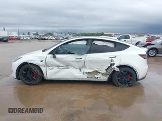 2022 Tesla Model Y Performance with VIN 7SAYGDEF1NF456829, listed as a IAAI auction lot 41448425 with 41,380 mi miles and . Bid and sale history available at DreamBid. Image 13.