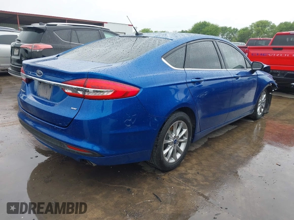2017 Ford Fusion SE z VIN 3FA6P0H79HR170835, wystawiony jako IAAI lot #41911416 z przebiegiem 67 219 mil mil oraz . Historia ofert i sprzedaży dostępna na DreamBid. Obrazek 4.