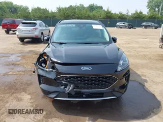 2021 Ford Escape SE Hybrid with VIN 1FMCU0BZ3MUA36546, listed as a IAAI auction lot 42465773 with 13,413 mi miles and . Bid and sale history available at DreamBid. Image 13.