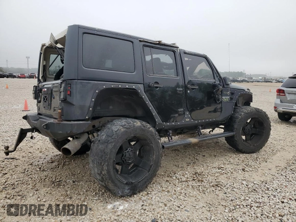 2012 Jeep Wrangler Unlimited Rubicon with VIN 1C4HJWFG7CL205244, listed as a Copart auction lot 86651914 with Not provided miles and Salvage title. Bid and sale history available at DreamBid. Image 3.