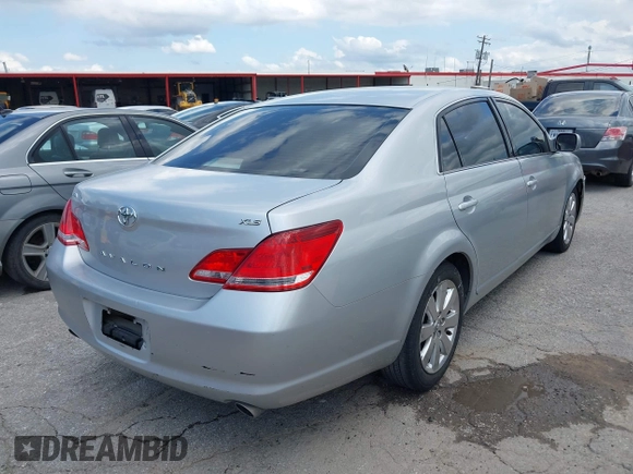 2006 Toyota Avalon XL with VIN 4T1BK36B86U127735, listed as a IAAI auction lot 42112001 with 173,861 mi miles. Bid and sale history available at carsss.com. Image 4.