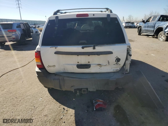 2002 Jeep Grand Cherokee Laredo with VIN 1J4GW48S72C298133, listed as a Copart auction lot 43973315 with 266,437 mi miles and Salvage Title. Bid and sale history available at carsss.com. Image 6.