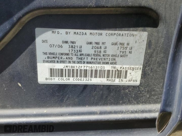 2007 Mazda 3 i Touring with VIN JM1BK12F771613103, listed as a Copart auction lot 52523994 with 259,387 mi miles and Salvage Title. Bid and sale history available at DreamBid. Image 12.