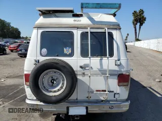 1994 GMC Vandura z VIN 1GDEG25KXRF519134, wystawiony jako Copart lot #75056124 z przebiegiem 245 597 mil mil oraz Szkody całkowita. Historia ofert i sprzedaży dostępna na DreamBid. Obrazek 6.